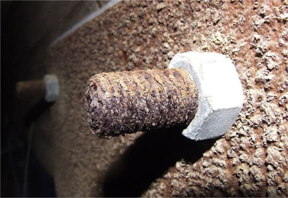 Ferrous bolt with rusted with a non ferrous nut