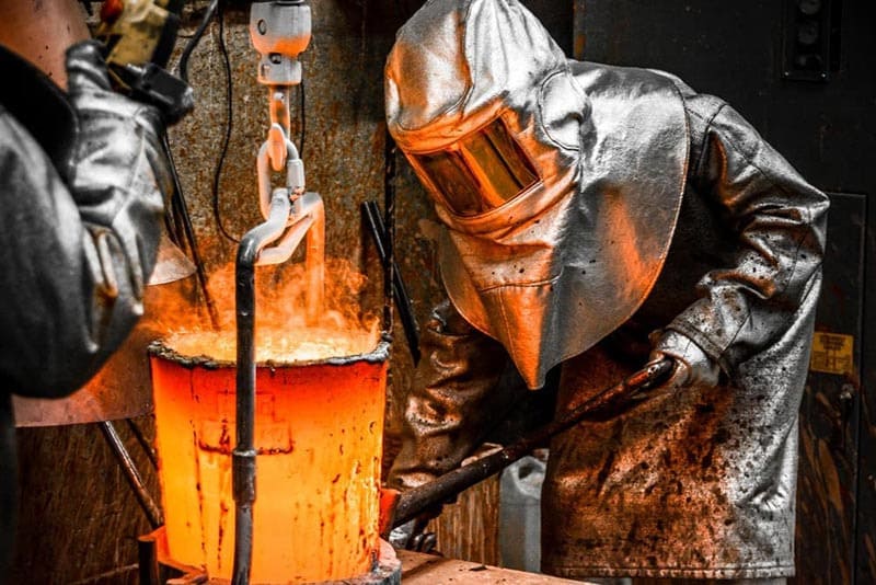 Working next to aluminum water in protective clothing